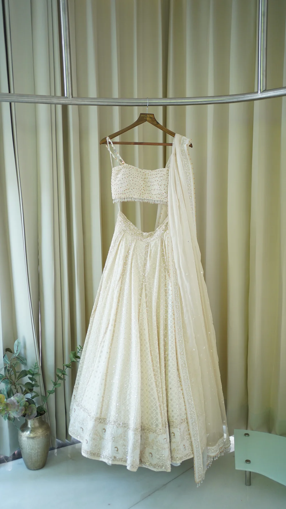 Ivory Chanderi Lehenga paired with embellished blouse